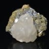 Calcite sur sidérite de Peyrebrune, Tarn. Fluorescente.