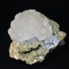 Calcite sur sidérite de Peyrebrune, Tarn. Fluorescente.