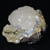 Calcite sur sidérite de Peyrebrune, Tarn. Fluorescente.