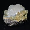 Calcite sur sidérite de Peyrebrune, Tarn. Fluorescente.
