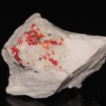 Hatchite, wallisite et réalgar, carrière de Lengenbach, Binntal, Suisse.