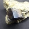 Cassitérite sur Muscovite, mine de La Villeder, Roc-Saint-André, Morbihan.