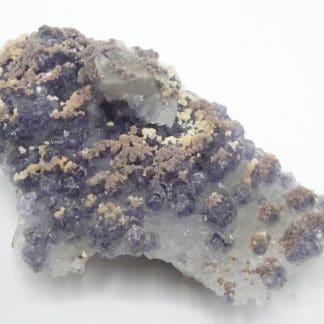 Calcite ferrifère sur Fluorite violacée, mine de Fontsante, Var.