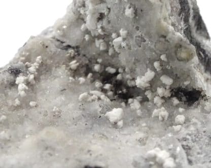 Hydrocérusite, manganèse, Torr Quarry, Somerset, Royaume-Uni.