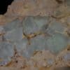 Fluorine verte en octaèdres sur Calcédoine, Mine de la Barre, Saint-Jacques-d’Ambur, Auvergne.