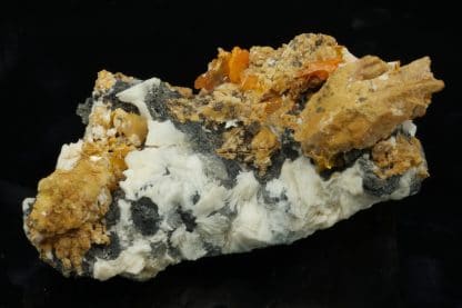 Wulfénite sur baryte, district minier de Mibladen, Midelt, Maroc.