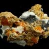 Wulfénite sur baryte, district minier de Mibladen, Midelt, Maroc.