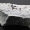 Hatchite, wallisite et réalgar, carrière de Lengenbach, Valais, Suisse.