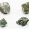 14 Cristaux de Cuprite pseudomorphosée en malachite de Chessy.