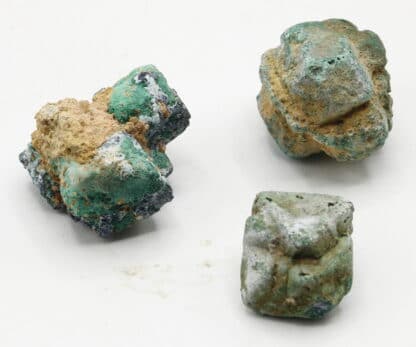 14 Cristaux de Cuprite pseudomorphosée en malachite de Chessy.