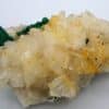 Pseudomorphose de chalcopyrite en malachite sur cristaux de dolomite, Eugui, Espagne.