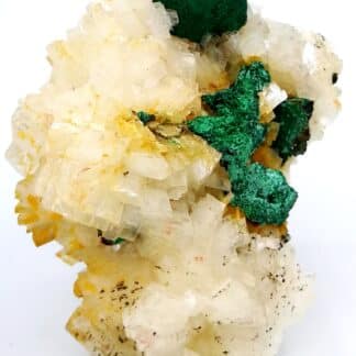 Pseudomorphose de chalcopyrite en malachite sur cristaux de dolomite, Eugui, Espagne.