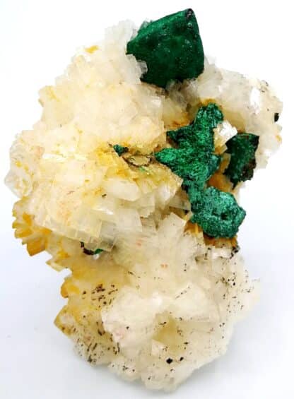 Pseudomorphose de chalcopyrite en malachite sur cristaux de dolomite, Eugui, Espagne.